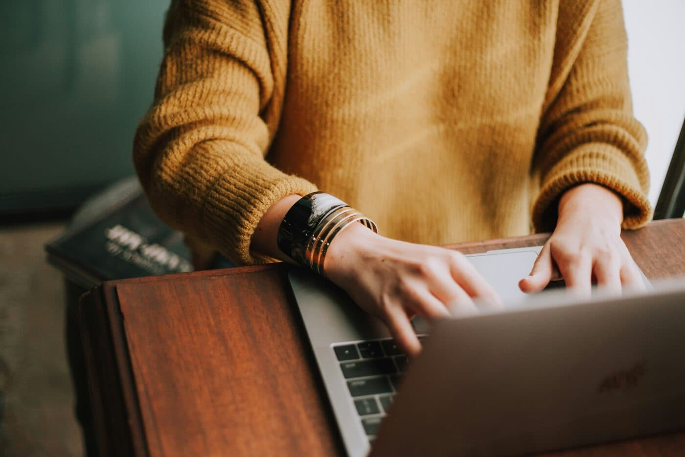 A small-business owner working at a laptop