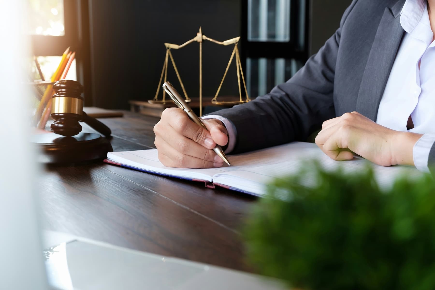 An attorney meeting with a client in a law office